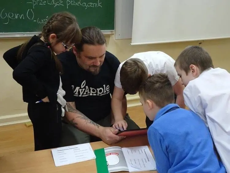 Krystian teaching at school